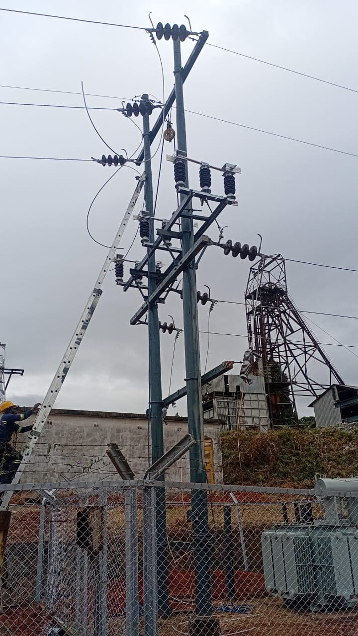 High-voltage distribution pole with insulators at Redwing Mine substation